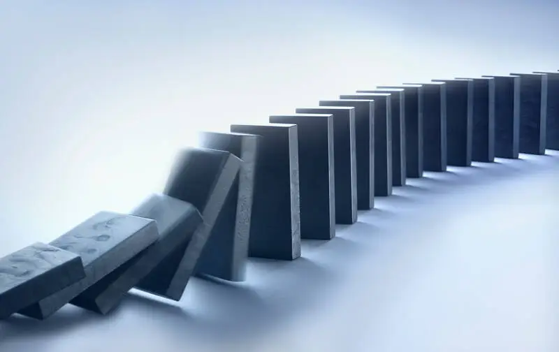 Dominoes Falling in a Line